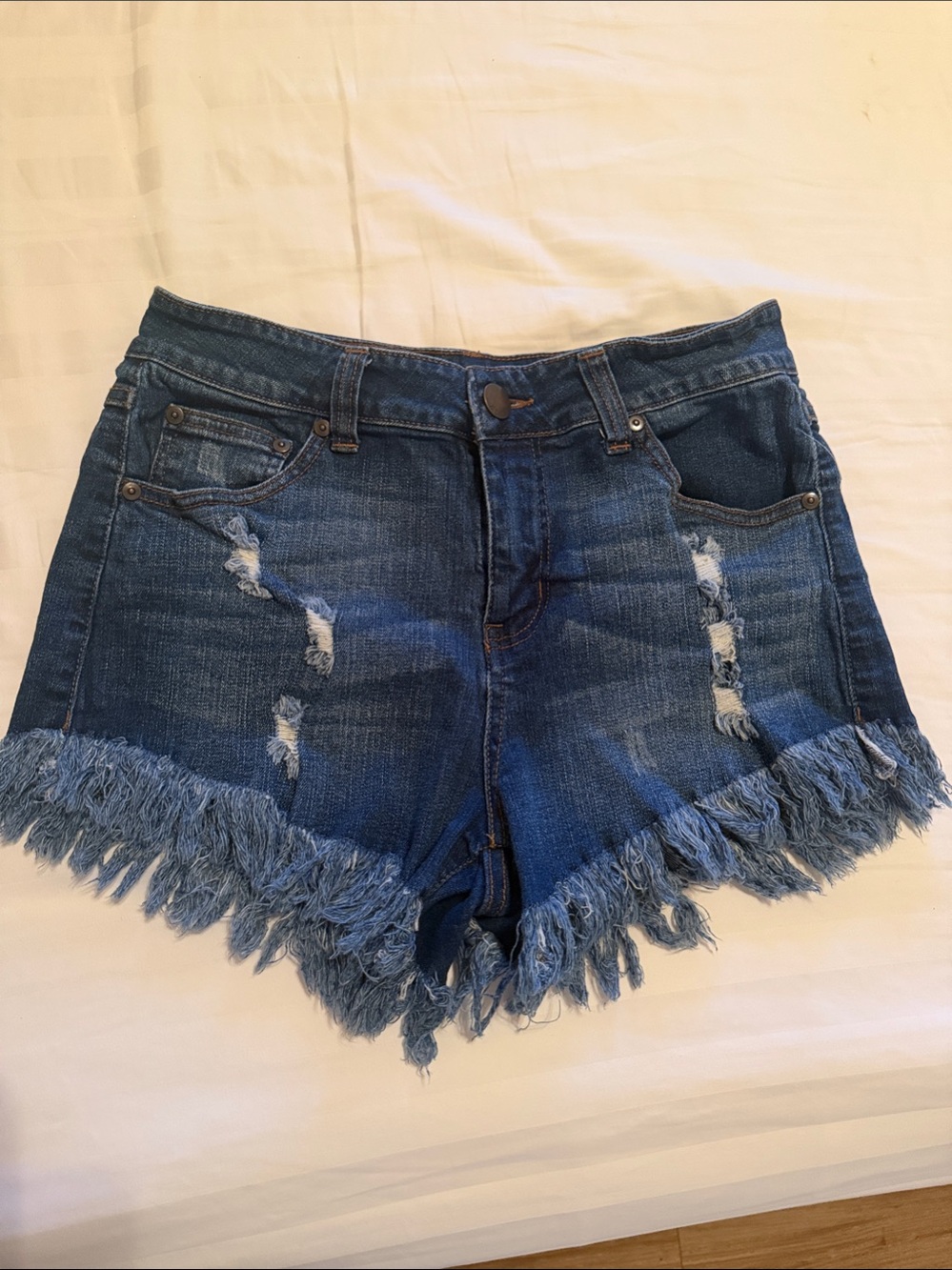 Elan Medium Blue Distressed Fringe Hem Denim Shorts